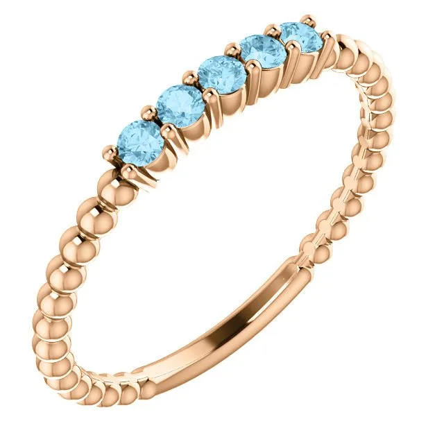 14KT GOLD 0.15 CTW ROUND AQUAMARINE 5 STONE BEADED STACKABLE RING